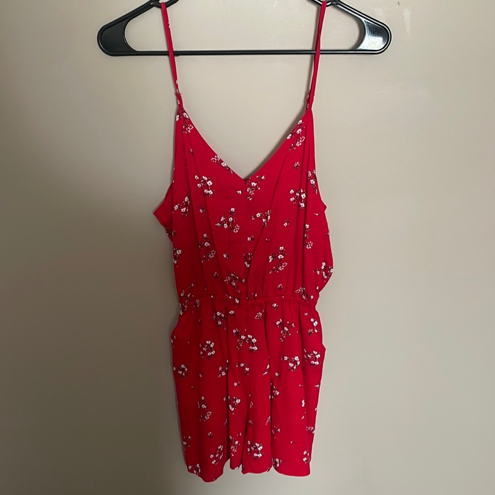 red flowered romper. size small.